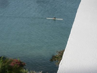 Early morning oar man in shell